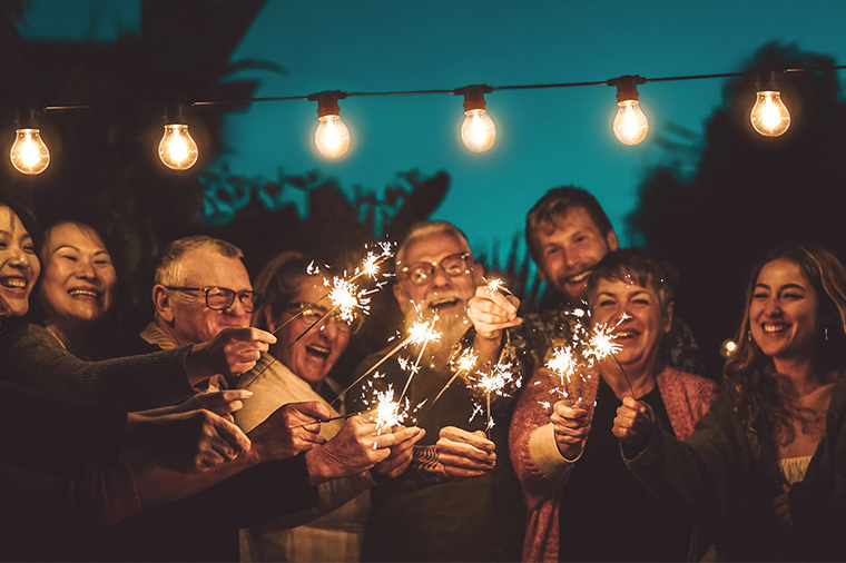 group of friends holding sparklers simple retirement plan bellevue wa.